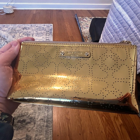 kate spade Handbags - GOLD Kate spade makeup bag like new